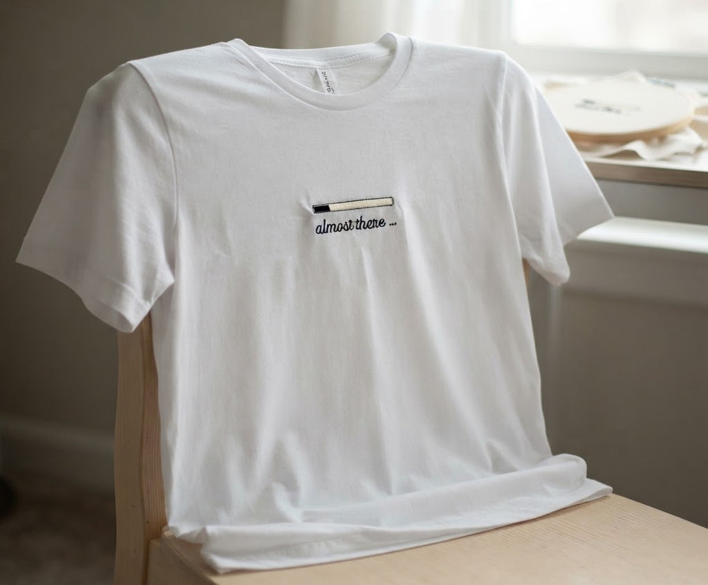Almost There Tee — Glow-in-the-Dark Embroidered Loading Bar
