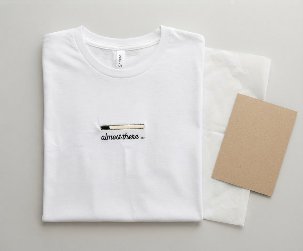 Almost There Tee — Glow-in-the-Dark Embroidered Loading Bar
