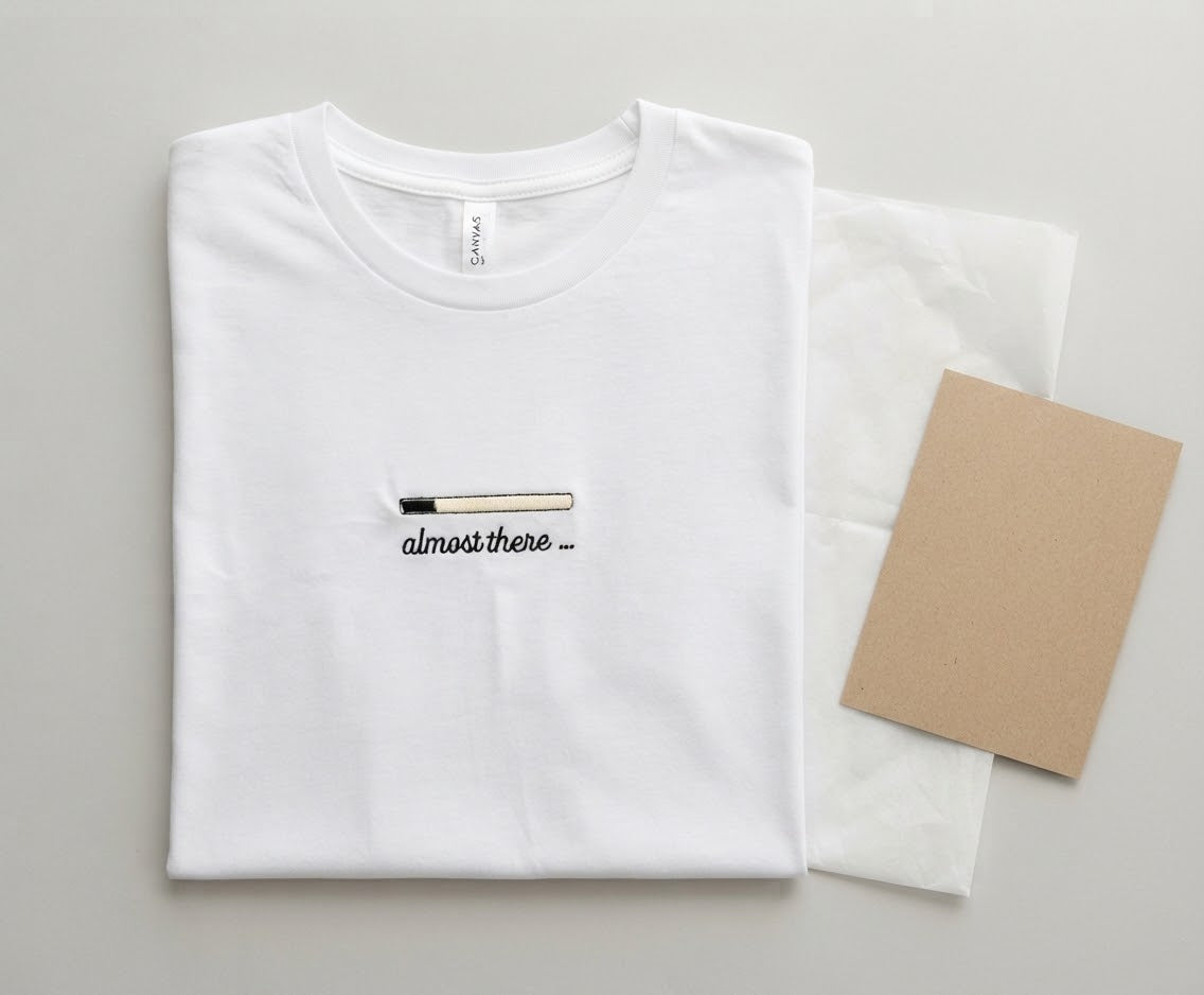Almost There Tee — Glow-in-the-Dark Embroidered Loading Bar