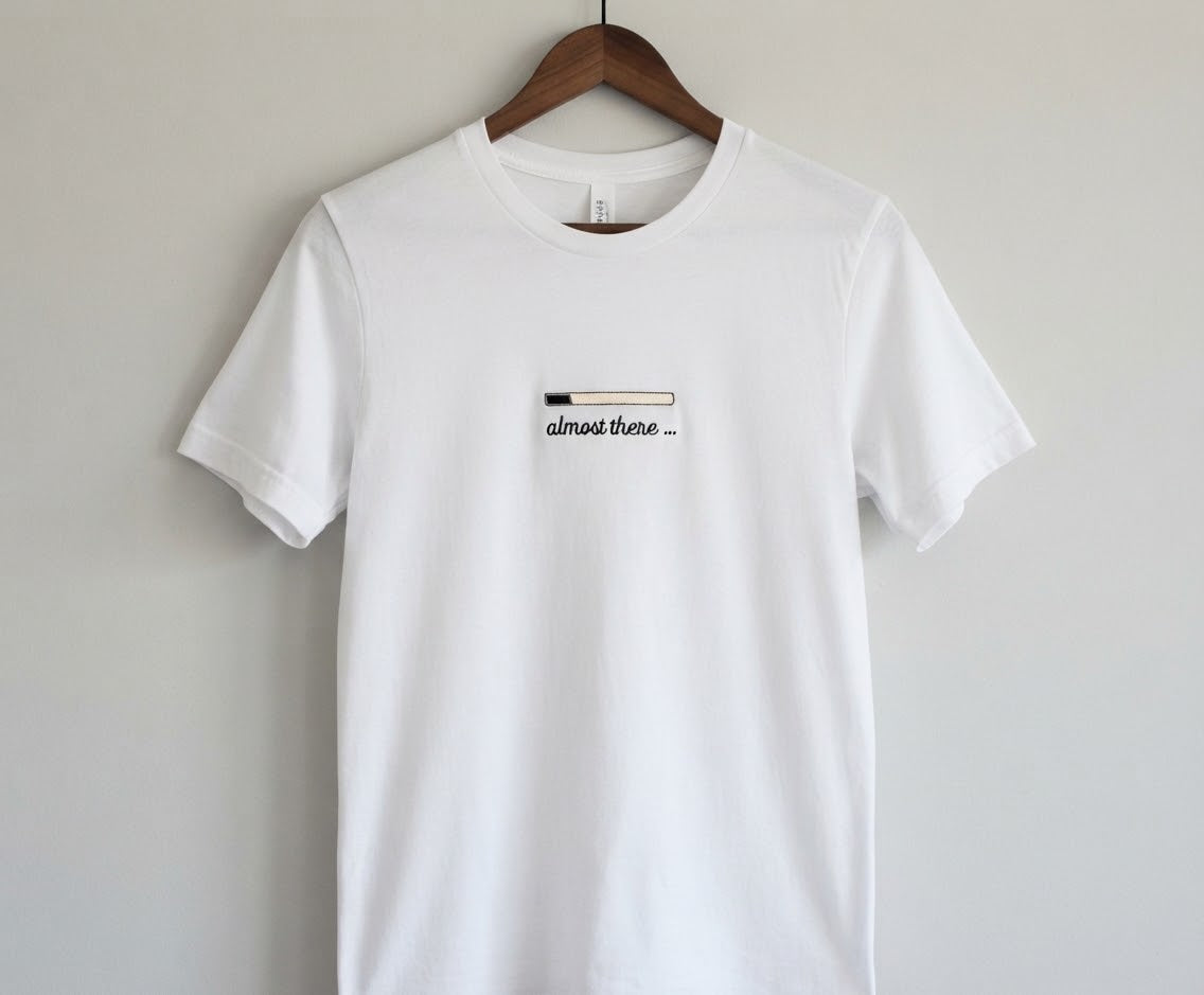 Almost There Tee — Glow-in-the-Dark Embroidered Loading Bar