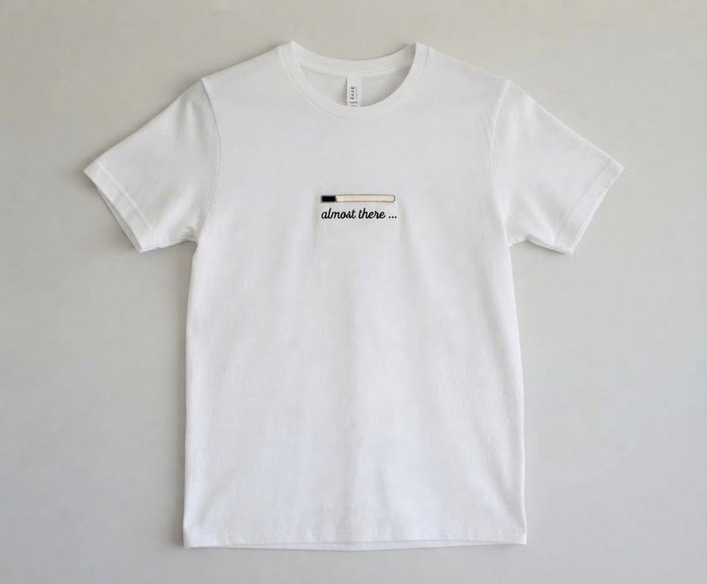 Almost There Tee — Glow-in-the-Dark Embroidered Loading Bar