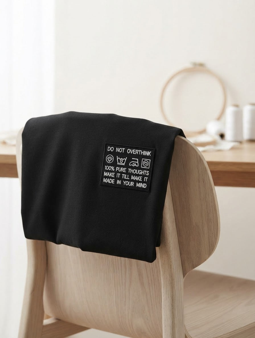Do Not Overthink Tee — Embroidered Care Label